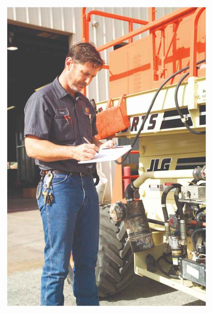 Inspector looking at machine