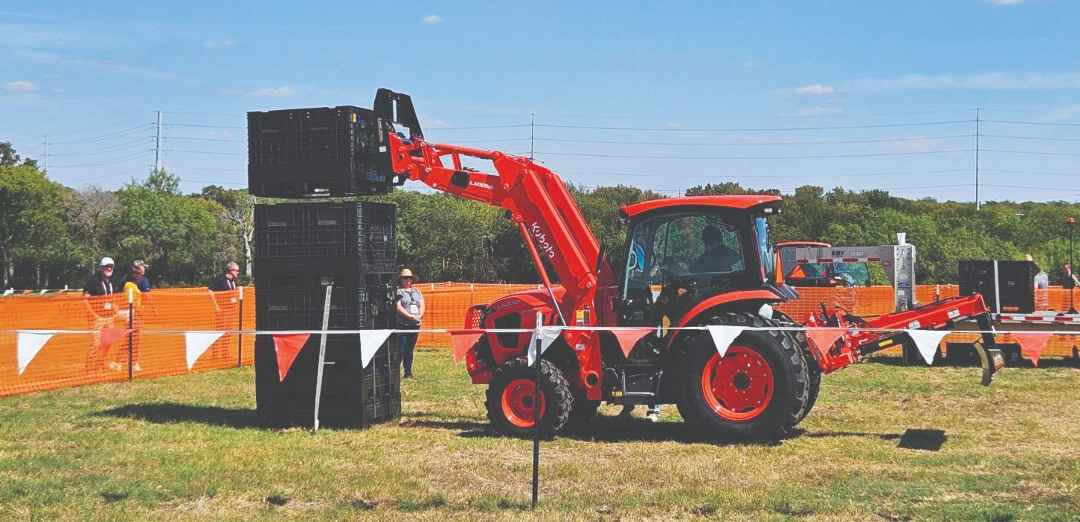Grand L70 Lifting a plastic bin with a fork attachment