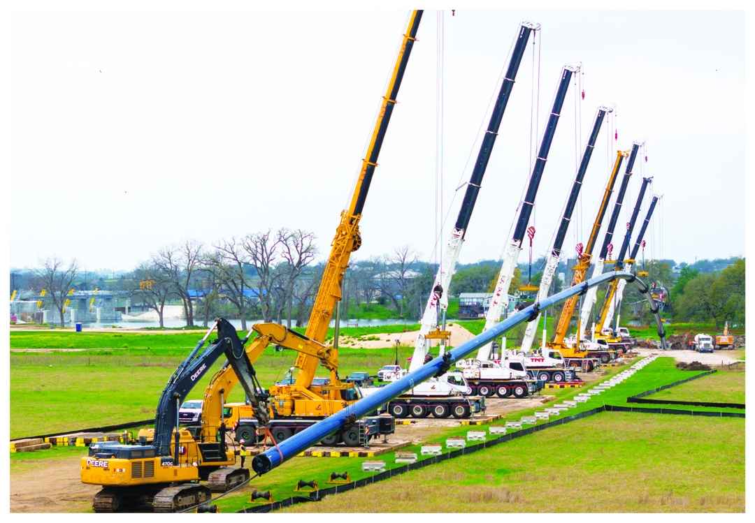 Cranes on pipeline side view