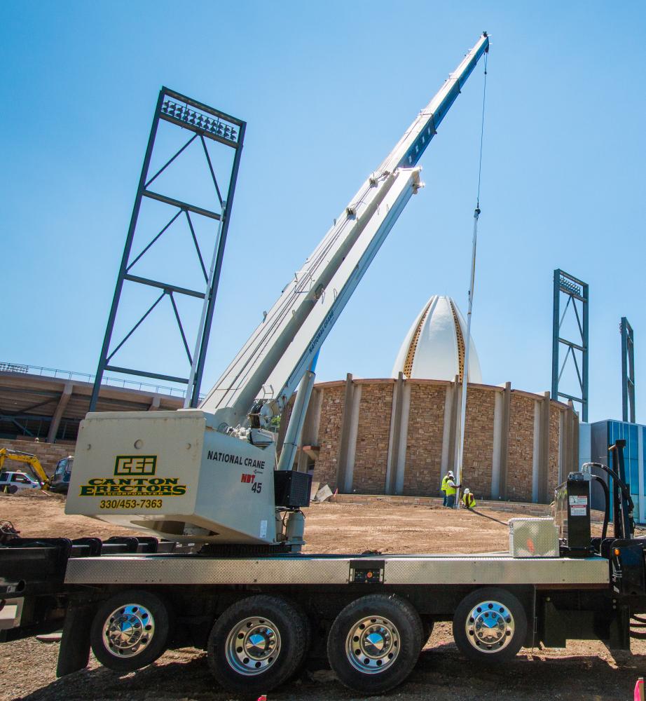 Canton Erectors Erects Flagpoles with National NBT45 Boom Truck